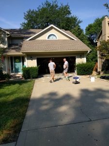 Ken and Jason with Conccrete Raising Systems, lifting a driveway in Kansas City.