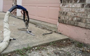 Driveway-Repair-Poly-Jacking-Before-Concrete-Raising-Systems-7318-N-Donnelly-Ave-Kansas-City-MO-64158                     